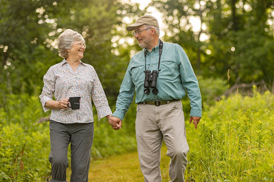 2024_06_25_RuralFirst_Ohio_4516 Larry and Elaine enjoy bird watching and exploring their land which doubles as a nature preserve.